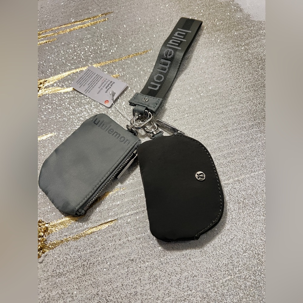 Lululemon dual pouch wristlet word mark